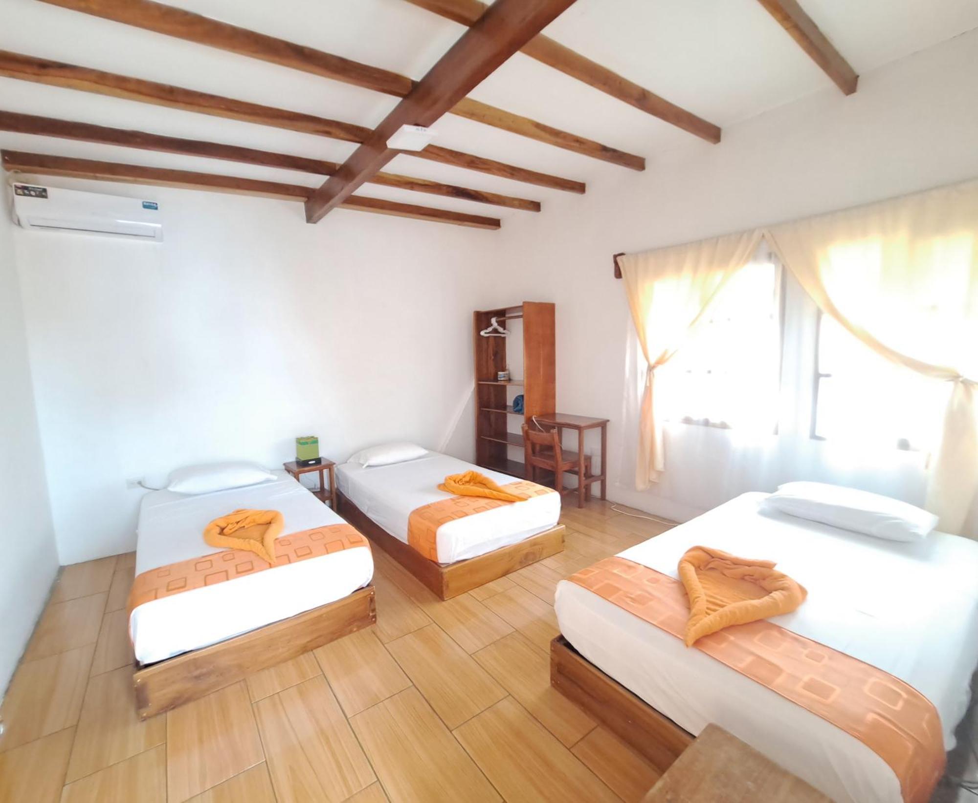 Hostal Tero Real Puerto Villamil Rum bild